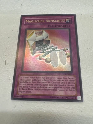 GERMAN - Magical Arm Shield TP8-EN001 - Tournament Pack Ultra Rare - NM - Image 1 of 2