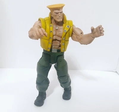 Figura de acción suelta Neca Street Fighter SDCC Guile Charlie 7" Foto 1 de 4