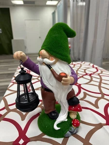 Garden sculpture, outdoor, green-hatted gnome, holding a lantern, autumn, artwor - Picture 1 of 1