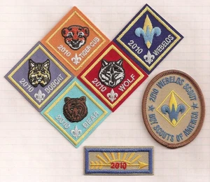 BSA 100TH 2010 CUB SCOUT RANK TIGER BOBCAT WOLF BEAR WEBELOS SET OF 7 - Picture 1 of 3