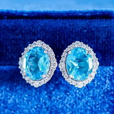 Par de pendientes de topacio natural y diamantes de corte ovalado de 4,50 quilates enchapados en oro blanco de 18 k Foto 1 de 4