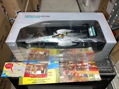 110130010 MINICHAMPS 1:18 MERCEDES PETRONAS HAMILTON GP CINA 2013 NEW SHIPP. WOR - Immagine 1 di 4