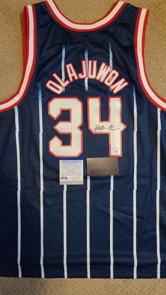 Hakeem Olajuwon 🚀 Signed M&N Rockets Autographed NBA Jersey PSA - Image 1 of 4
