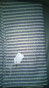 Stoffrest Polyester Stretch Strick 60" x 56" braun blau creme Farben - Bild 1 von 1