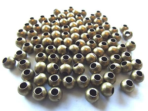Antique Brass Colored Spacer Beads. 6mm. Quantity Approx. 100. - Picture 1 of 1