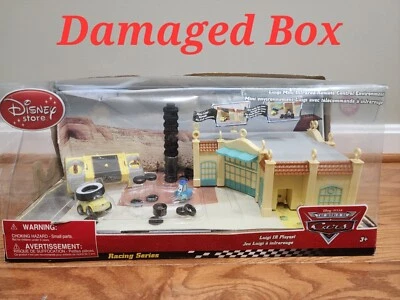 DISNEY STORE EXCLUSIVE WORLD OF CARS LUIGI MINI INFRARED REMOTE CONTROL PLAYSET - Image 1 of 4