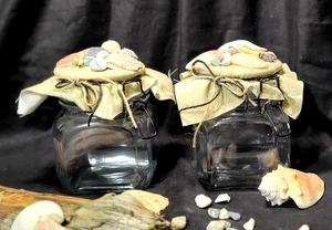 Paar robuste Glasgläser mit Strandmotiv und Metallverschlüssen zur Aufbewahrung - Bild 1 von 11