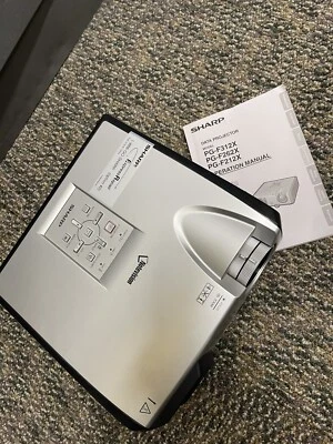 Sharp PG-F212X DLP Projector 2500 ANSI HD 1080i HDMI-adapter bundle - Image 1 of 4
