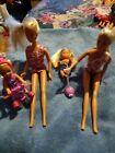 2 vintage Simba Steffi Love Baby Sitter dolls + 2 toddler dolls + scooter + toy.