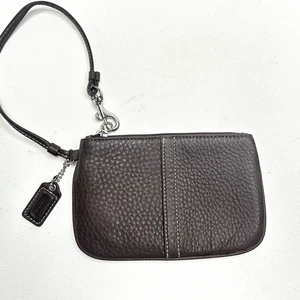 Bracciale Coach in pelle di mogano marrone ciottolato F42389 - Foto 1 di 8