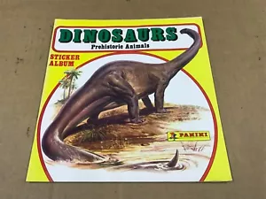 Álbum de pegatinas de animales prehistóricos Panini Dinosaurios 1986 vintage - sin usar - Imagen 1 de 6