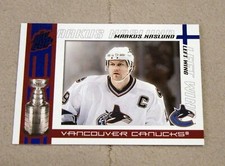 2003-04 Pacific Quest for the Cup Blue #100 Markus Naslund - Serial # /150