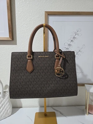 Michael Kors Sheila medium logo satchel in brown signature print faux leather. - Image 1 of 4