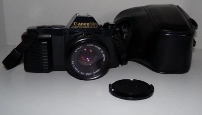 Cámara Canon T50 35 mm con lente FD 50 mm F1,8 y estuche de transporte original - Funciona muy bien Foto 1 de 4