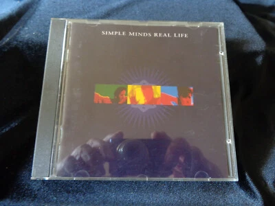 CD SIMPLE MINDS "Real Life" 12 Songs Zustand: neuwertig - Bild 1 von 3