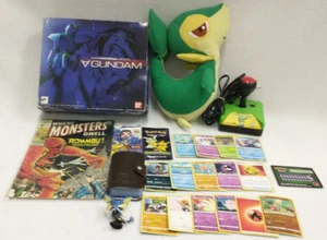 A Gundam New Material Model, Comic Book and Pokemon Cards - Picture 1 of 4