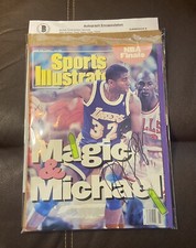 1991 Magic & Michael Autographed Sports Illustrated. With Frame.