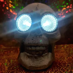 3.5" PLASTER SKULL W/ SOLAR LIGHT EYES Halloween garden ornament horror evil NEW - Picture 1 of 18
