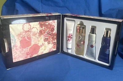 cle de peau Essential Radiance Set - Cleansing Foam, Protective Emulsion, Cotton - Image 1 of 4