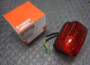 NEW Yamaha Banshee or Raptor rear oem taillight brake light lens bulb 2002-2006 - Picture 1 of 2