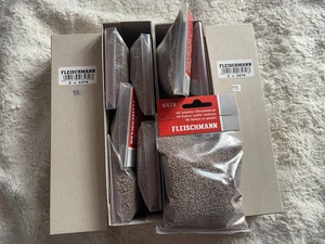 Fleischmann 6479 Spur H0 - 8 x Schotterstreumaterial  NEU + OVP - Bild 1 von 1