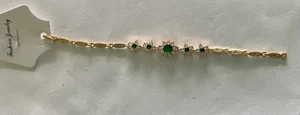 Brazalete de tenis de diamantes y esmeraldas sintéticas en tono dorado - Imagen 1 de 6