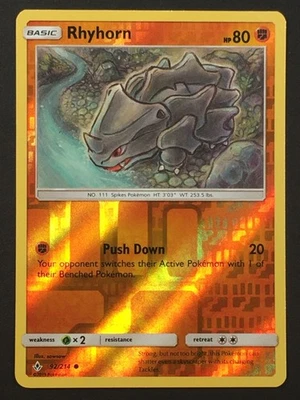 Pokemon TCG Rhyhorn 92/214 Reverse Holo Common SM Unbroken Bonds LP - Image 1 of 3