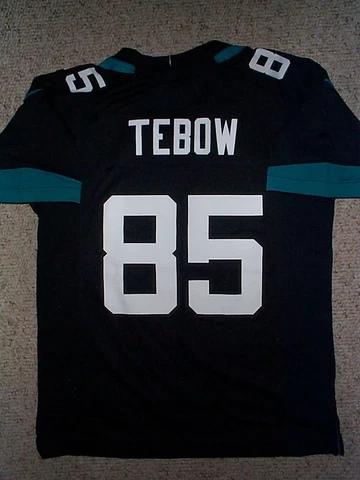 *IRREGULAR* Jax Jaguars TIM TEBOW nfl NIKE Jersey YOUTH KIDS BOYS (m-med-medium) Cover