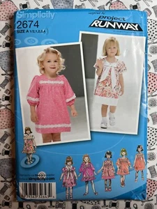 Vestidos para niños pequeños con patrón de costura Simplicity 2674 talla 1/2-4 corte a talla 4 - Imagen 1 de 3