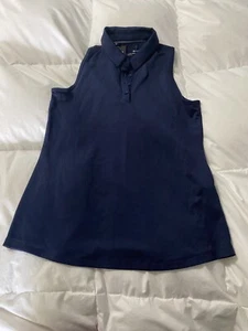 POLO MUJER UNDER ARMOUR ZINGER SIN MANGAS PEQUEÑO AZUL MARINO 1363950 NUEVO CON ETIQUETAS VENTA AL POR MENOR $55 - Imagen 1 de 3
