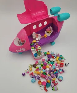 More than 80 assorted Shopkins in Shopkins Air Pink Jet Plane missing wings. - Picture 1 of 16