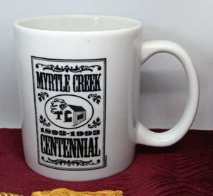 Myrtle Creek Centennial 1893-1993 weiß Keramik Kaffeebecher Tasse OREGON Tassen Becher - Bild 1 von 3