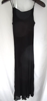 Vestido Tessuto para mujer negro LBD midi sin mangas de rayón talla L usado en excelente estado Foto 1 de 4