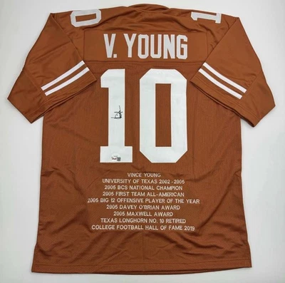 Camiseta de fútbol americano universitario autografiada/firmada Vince Young Texas Orange Stat certificado de autenticidad JSA Foto 1 de 4
