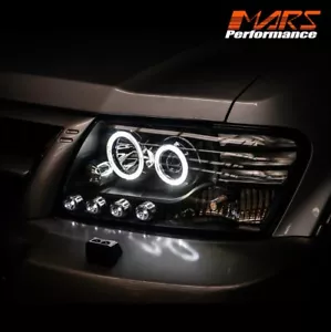 Black High Power LED Angel-Eyes Head lights for MITSUBISHI PAJERO 2000-06 NM NP - Picture 1 of 13