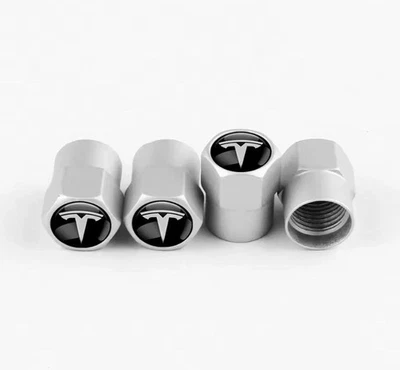 TESLA 4x Silver Tyre Valve Dust Caps BRAND NEW - Image 1 of 3