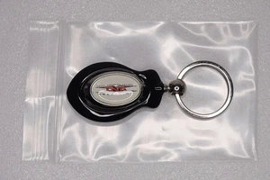 Official TNA Wrestling Keychain Total Nonstop Action - Picture 1 of 2