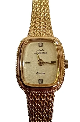 Reloj pulsera Jules Jurgensen Petite tono dorado esfera rectangular caja texturizada Foto 1 de 4