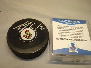 Disco de hockey firmado por Dion Phaneuf de los Senadores de Ottawa autografiado Beckett certificado de autenticidad BAS 1A - Imagen 1 de 3