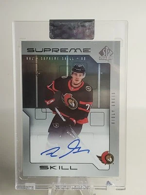 Ridly Greig 2023-24 Upper Deck Clear Cut Supreme Skill Rookies Auto Senators RC  - Image 1 of 3