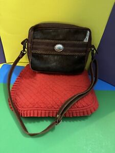 Myra Bag Crossbody with Turquoise Stone in Middle of Front.