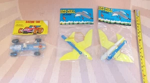 Vintage Plastic Toy Lot Sea Gull Gliders & Racing Car Sealed Lot - Picture 1 of 5
