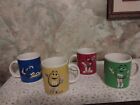 Set of four (4) M&M Collectible Coffee Mugs / Cups, Ceramic.  