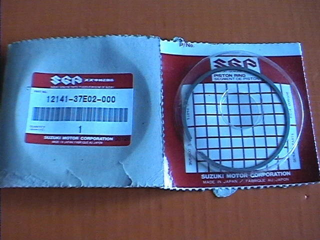 JUEGO DE ANILLOS DE PISTÓN SUZUKI GENUINOS 12141-37E02-000 RM250 RM250Z 1996-2006 RM 250 MX Foto 1 de 1