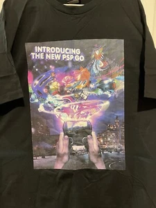 PSP GO, AUSTRALIAN RELEASE ADVERTISEMENT TSHIRT SIZE XL. - Bild 1 von 4