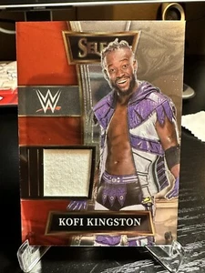 KOFI KINGSTON 2022 WWE PANINI SELECT - SELECTIVE SWATCHES - Picture 1 of 2