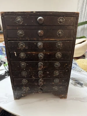 Armario boticario vintage de madera con 8 cajones para coleccionistas Foto 1 de 4