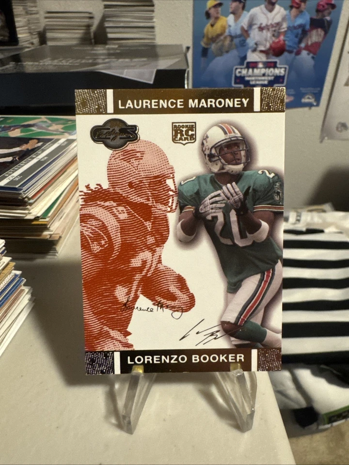 2007 Topps CoSigners Gold Laurence Maroney Lorenzo Booker #63 Red Changing Faces - Image 1 of 3