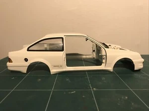 1/18 Minichamps Ford Sierra Rs Cosworth Carrozzeria Finestre Luci Ect Ricambi - Foto 1 di 7