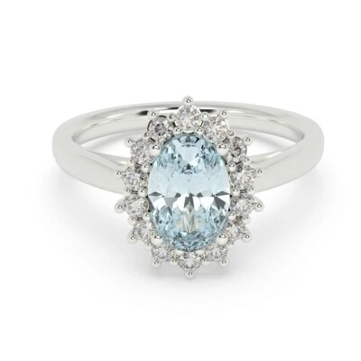 Anillo de compromiso con racimo de diamantes y aguamarina ovalada natural de 1,30 quilates en oro blanco Foto 1 de 4